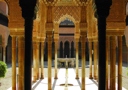 Columns of the palace of Alhambra in Granada, Spain with the view of the Court of Lions